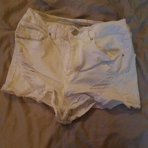White ripped shorts